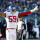 Dec 26, 2021; Philadelphia, Pennsylvania, USA; New York Giants outside linebacker Lorenzo Carter (59) reacts against the Philadelphia Eagles during the second quarter at Lincoln Financial Field.